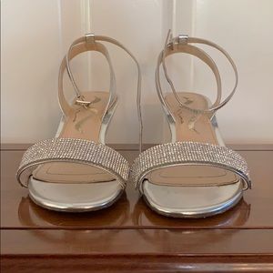 Women’s silver Nina sandals with rhinestones.